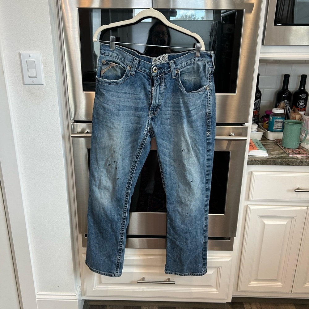 Ariat Men's Relaxed Denim Jeans size 34/30 have wear stains hole